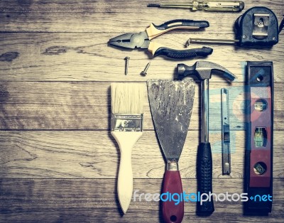 Set Of Tools Over A Wood Background Stock Photo