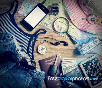 Set Of Travel Accessory On Wooden Background Stock Photo