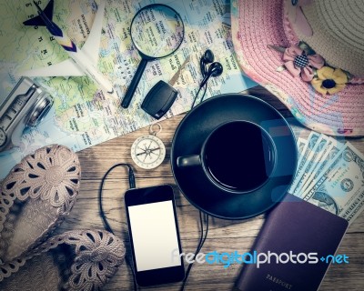 Set Of Travel Accessory On Wooden Background Stock Photo