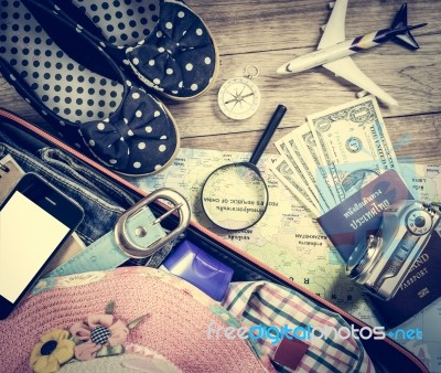 Set Of Travel Accessory On Wooden Background Stock Photo