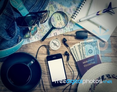 Set Of Travel Accessory On Wooden Background Stock Photo