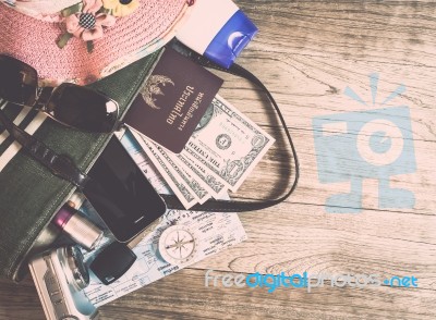 Set Of Travel Accessory On Wooden Background Stock Photo