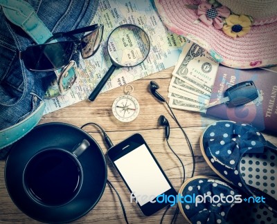 Set Of Travel Accessory On Wooden Background Stock Photo