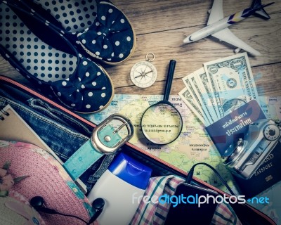 Set Of Travel Accessory On Wooden Background Stock Photo