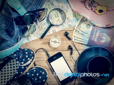 Set Of Travel Accessory On Wooden Background Stock Photo