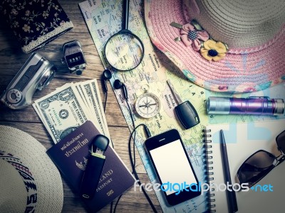 Set Of Travel Accessory On Wooden Background Stock Photo