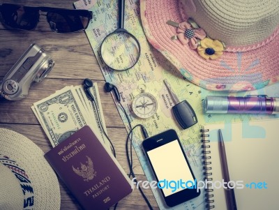 Set Of Travel Accessory On Wooden Background Stock Photo