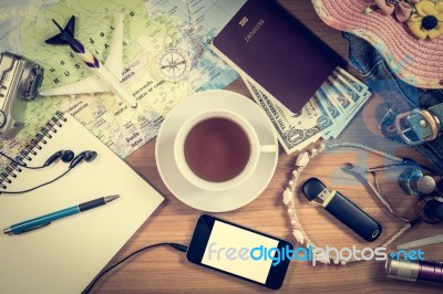 Set Of Travel Accessory On Wooden Background Stock Photo