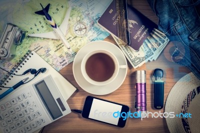 Set Of Travel Accessory On Wooden Background Stock Photo