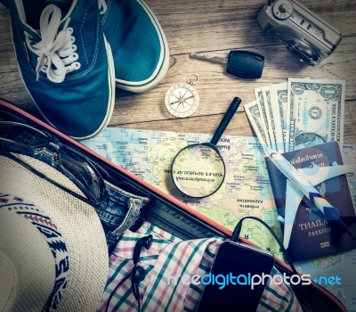 Set Of Travel Accessory On Wooden Background Stock Photo