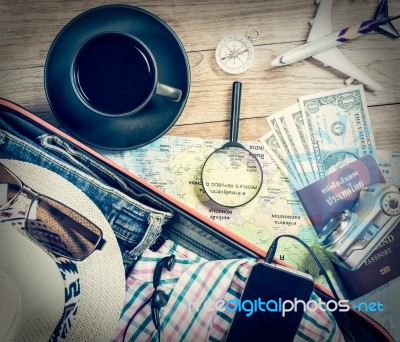 Set Of Travel Accessory On Wooden Background Stock Photo