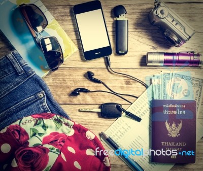 Set Of Travel Accessory On Wooden Table Stock Photo