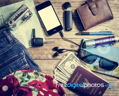 Set Of Travel Accessory On Wooden Table Stock Photo