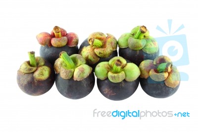 Seven Natural Mangosteens On White Background Stock Photo