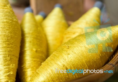 Sewing Threads Golden Color Stock Photo