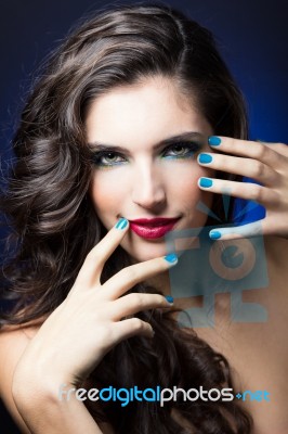 Sexy Beauty Girl With Red Lips And Blue Nails Stock Photo