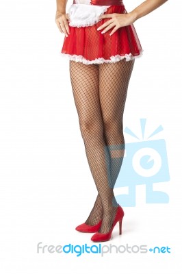 Sexy Maid Legs In Fishnet Stockings Stock Photo