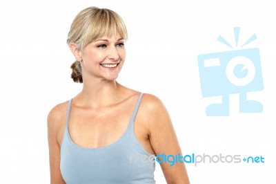 Sexy Smiling Blonde Looking Sideways Stock Photo