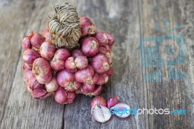 Shallot Onions In A Group On Wood Stock Photo