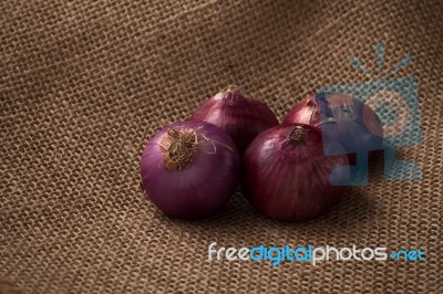 Shallots Still Life Sack Background Stock Photo