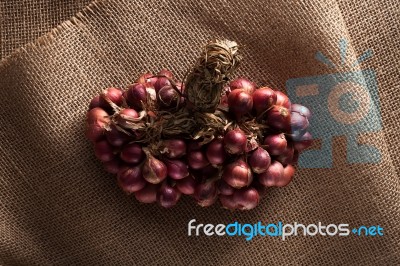 Shallots Still Life Sack Background Stock Photo