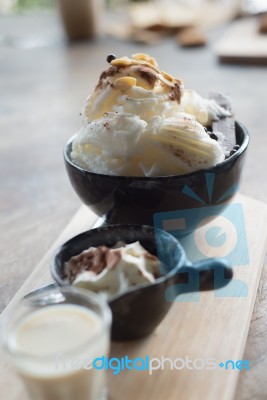 Shaved Ice Dessert With Brown Sugar And Condensed Milk Stock Photo