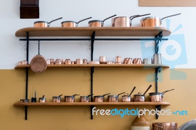 Shelves Full With Copper Saucepans Stock Photo