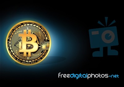 Shiny Golden Bitcoin Stock Photo