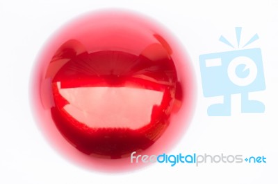 Shiny Hard Red Ball On White Background Stock Image