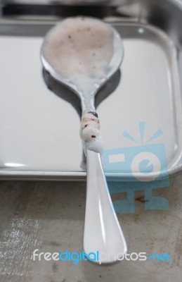 Shiny Milk Chocolate Stain Spoon Stock Photo