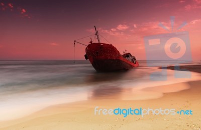 Ship After Wreck On The Coast Stock Photo