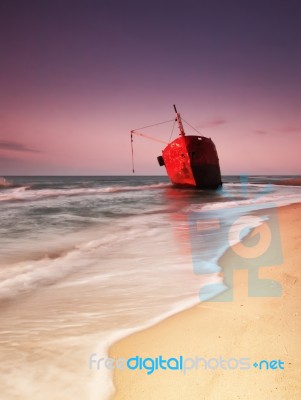 Ship After Wreck On The Coast Stock Photo