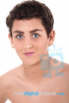 Shirtless Young Boy Smiling Stock Photo