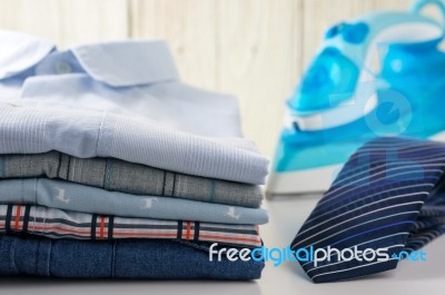 Shirts And Tie With Iron Stock Photo