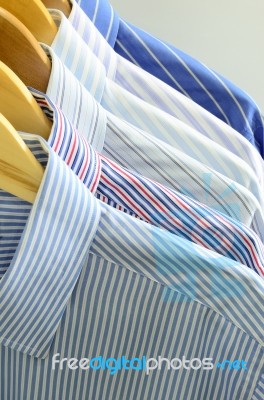 Shirts On Wooden Hanger Stock Photo