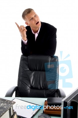 shocked Businessman Pointing up Stock Photo