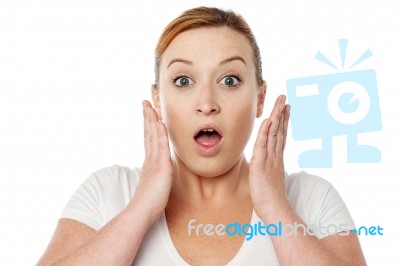 Shocked Young Woman Over White Stock Photo