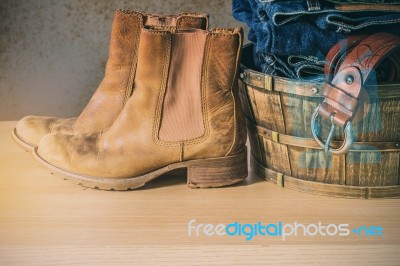 Shoes And Clothes On The Wooden Stock Photo