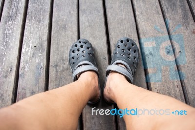 Shoes From An Aerial View On Wooden Background Stock Photo