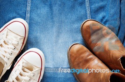 Shoes On A Denim Jacket Stock Photo