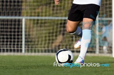 Shoot Of Football Player On The Outdoors Field Stock Photo