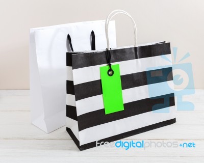 Shopping Bag With Green Tag Stock Photo