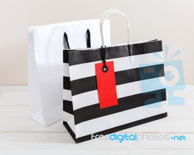 Shopping Bag With Red Tag Stock Photo