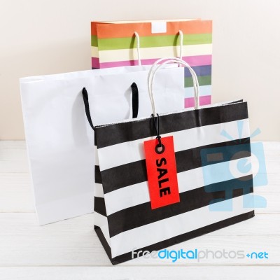 Shopping Bags With Red Sale Tag Stock Photo