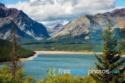 Shoreline Of Lower Two Medicine Lake Stock Photo