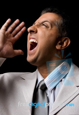 Shouting Adult Executive Looking Up Stock Photo