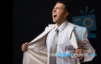 Shouting Boss Holding His Coat Stock Photo