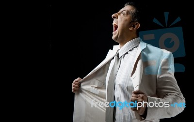 Shouting Manager Holding His Coat Stock Photo