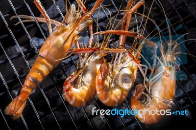 Shrimp Grilled On Barbeque Charcoast Oven Stock Photo