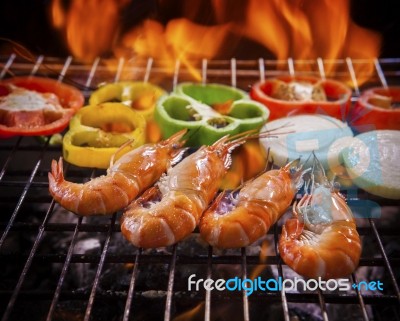 Shrimp,prawns Grilled On Barbecue Fire Stove With Chilly Onion For Seafood Meal Stock Photo